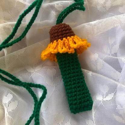 A small sunflower bookmark, finished and ready to wrap